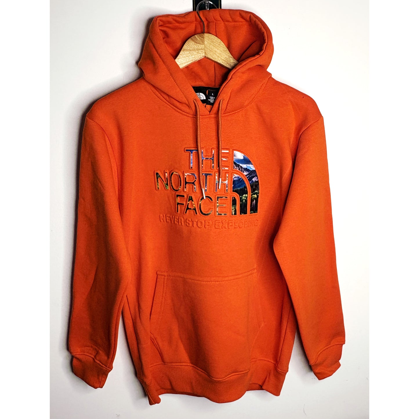 The North Face Luxury Orange Hoodie – Never Stop Exploring Edition