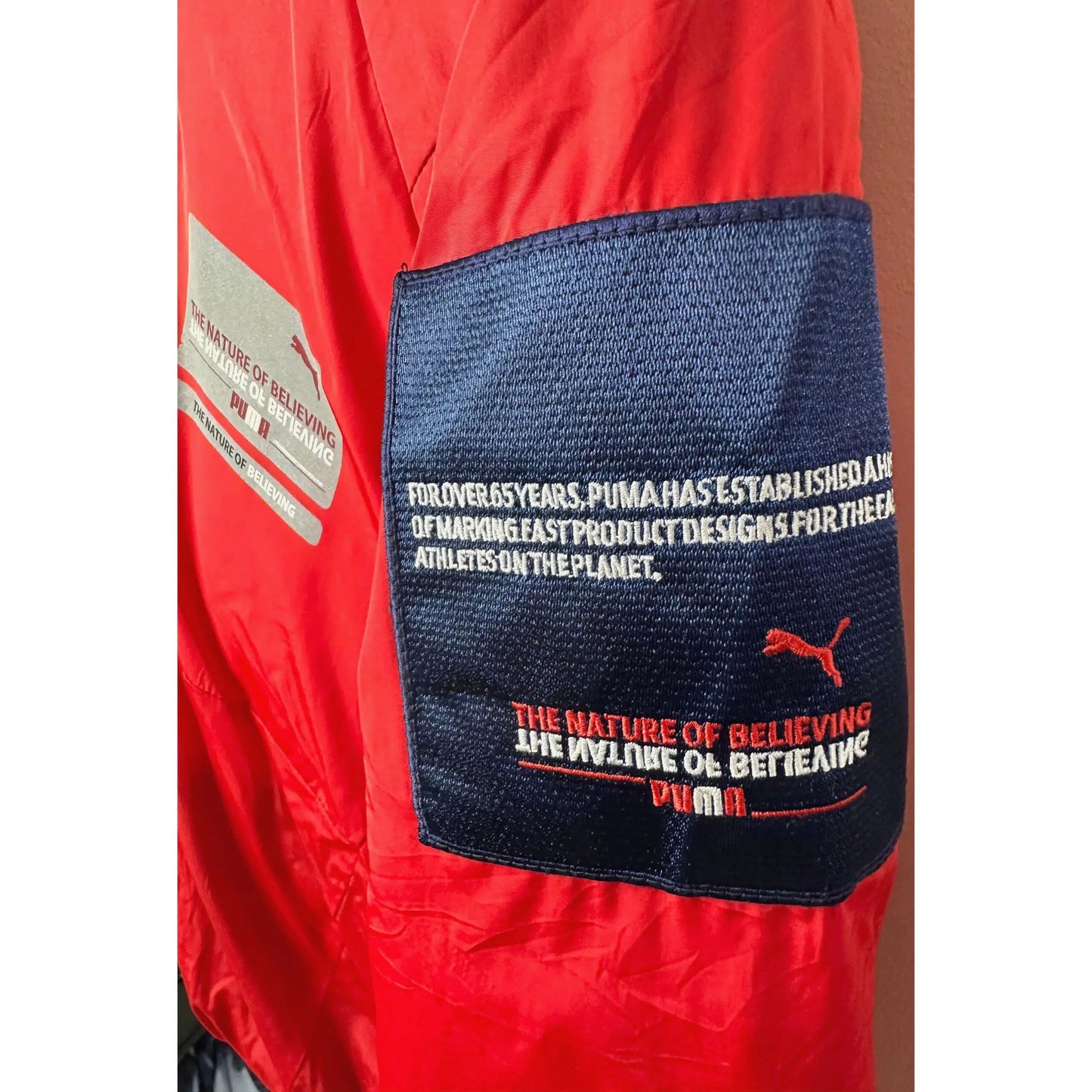PUMA THE NATURE OF BELIEVING RED SIZE M PREMIUM PUFFER JACKET
