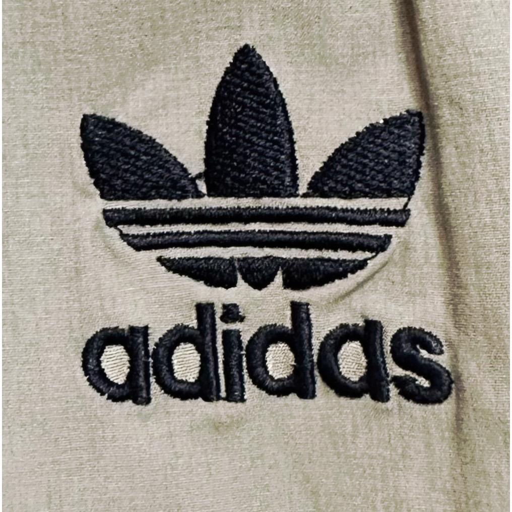 ADIDAS OLIVE GREEN TRACK PANTS FOR MEN – ICONIC THREE-STRIPE CASUAL SPORTSWEAR