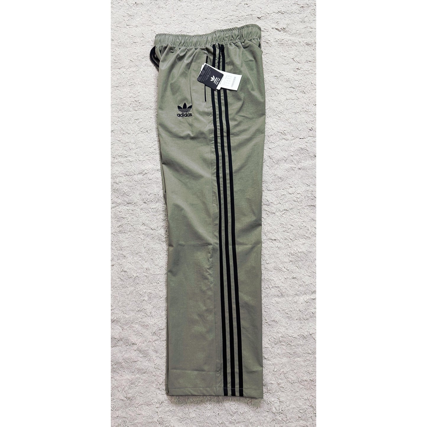 ADIDAS OLIVE GREEN TRACK PANTS FOR MEN – ICONIC THREE-STRIPE CASUAL SPORTSWEAR