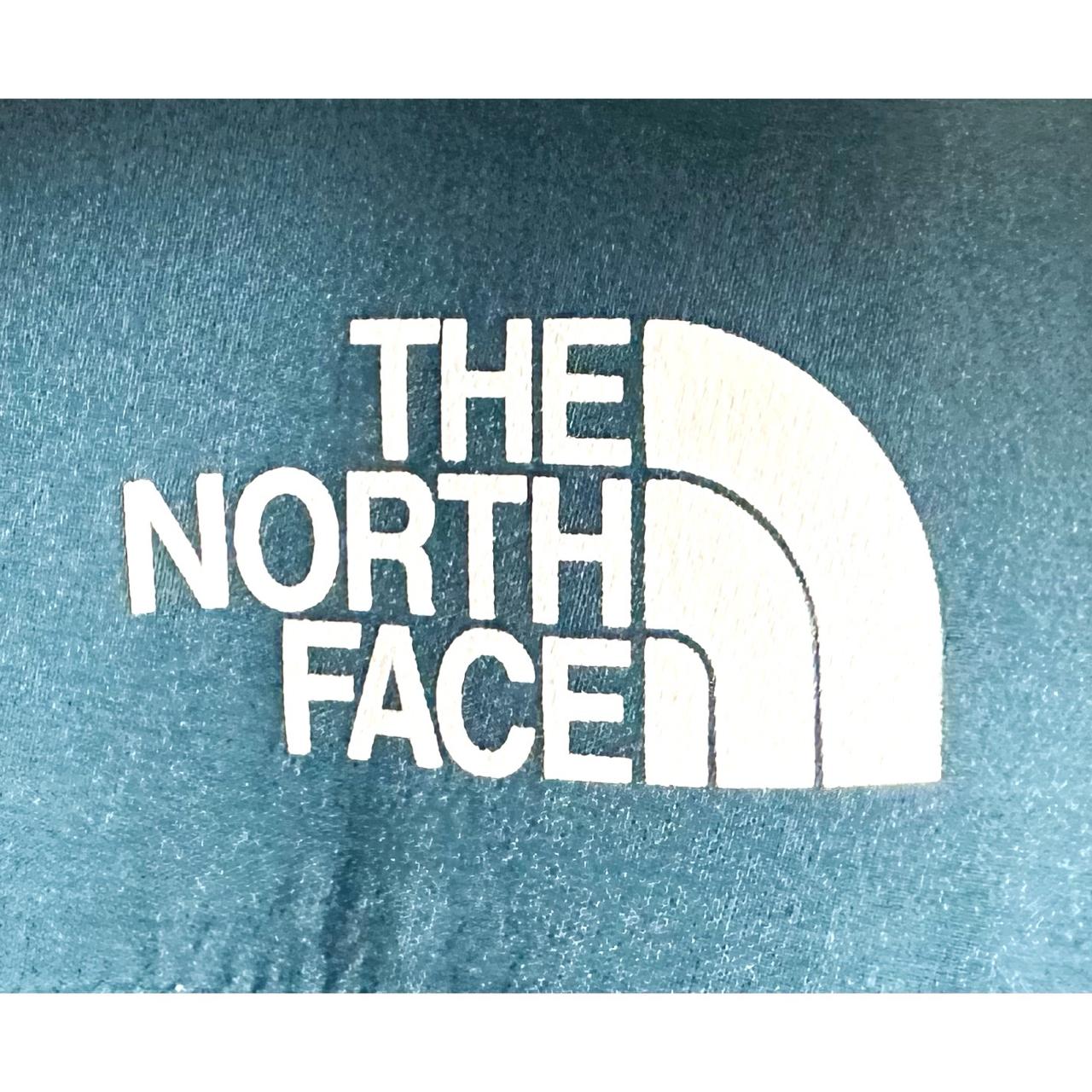 THE NORTH FACE WOMEN'S BLUE WINDBREAKER JACKET WITH PINK ZIP ACCENTS