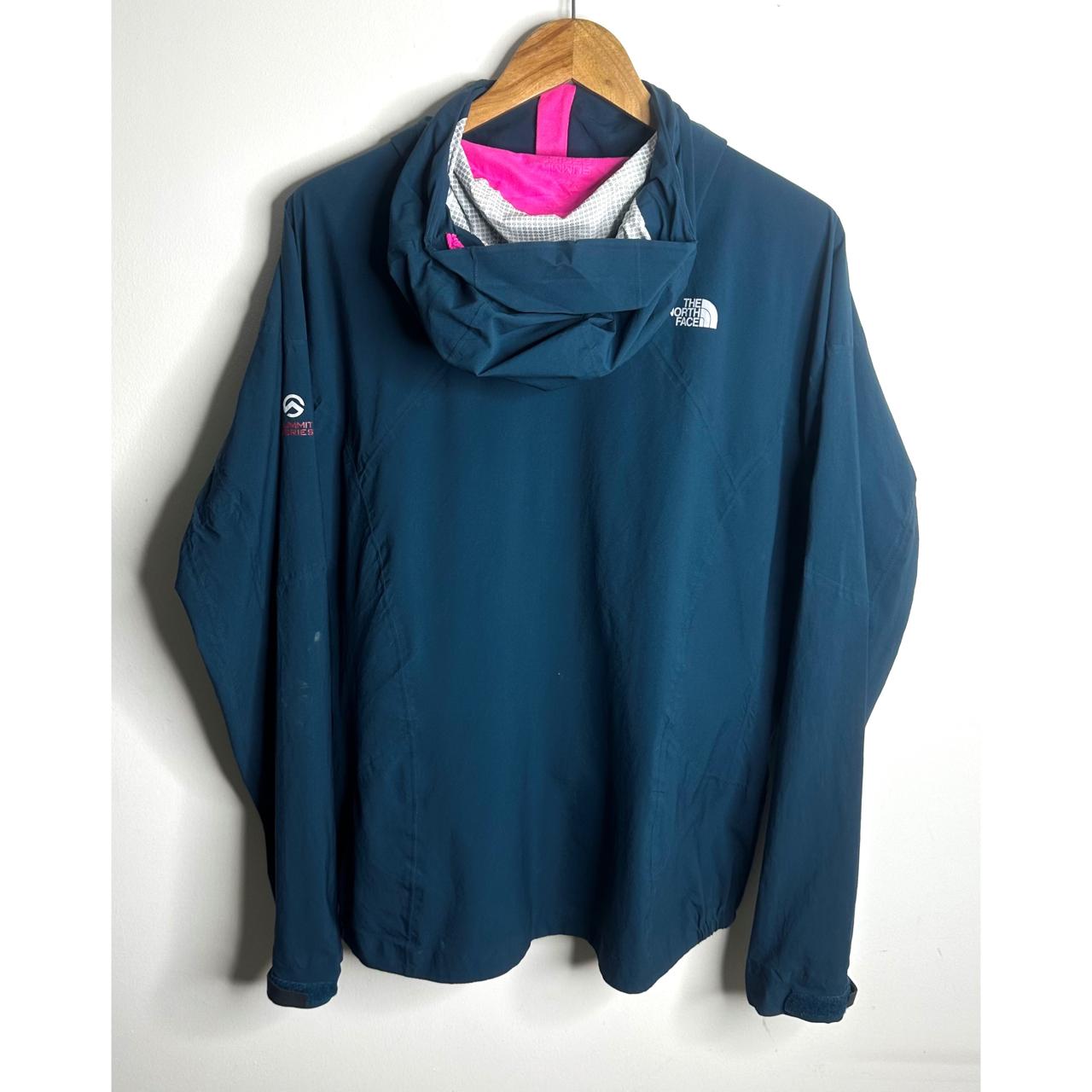THE NORTH FACE WOMEN'S BLUE WINDBREAKER JACKET WITH PINK ZIP ACCENTS