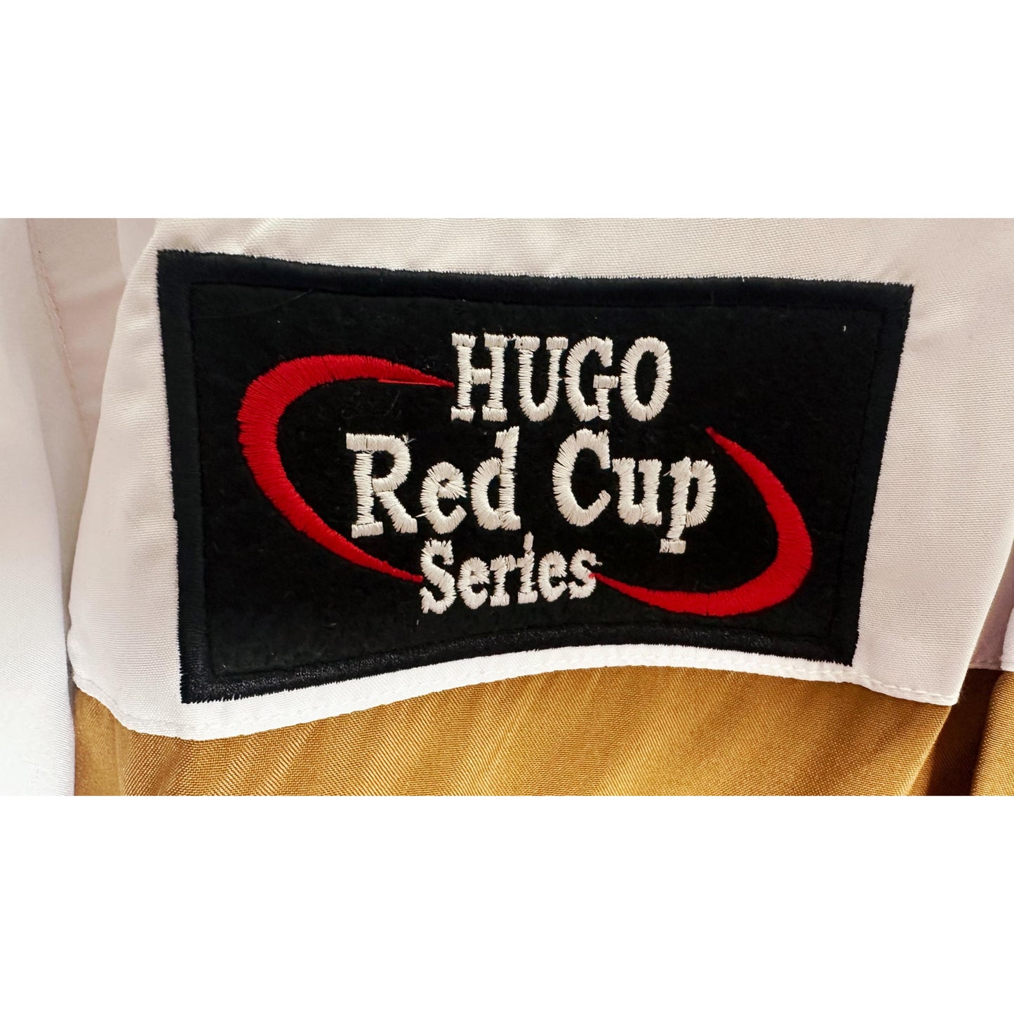 A high-impact colour-blocked jacket in a straight fit by HUGO Menswear, designed in strong cotton twill with racing-inspired badges and embroidery. Regular fit, point collar, fastening top: zip closure, pockets top: Patch pockets, inside zip pockets, ribb