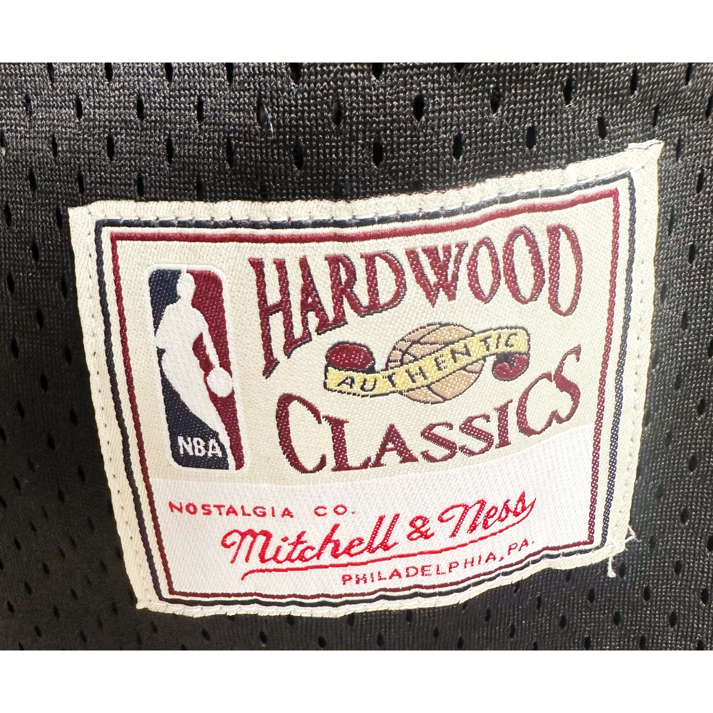 Miami Heat Hardwood Classics black jersey, inspired by the team’s classic late-1980s look and reissued by Mitchell & Ness
