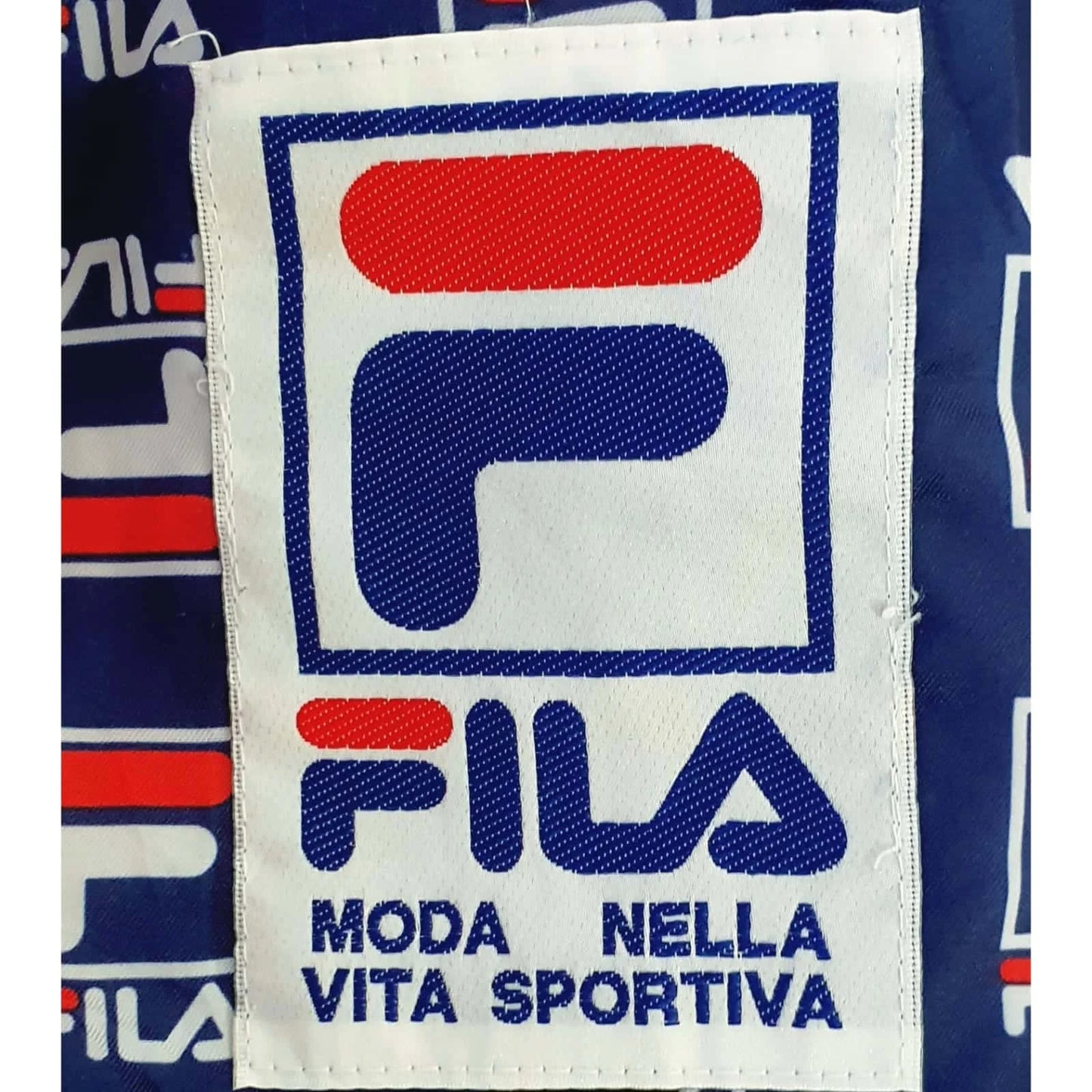 WHITE HEAVYDUTY FILA SIZE: M / L JACKET