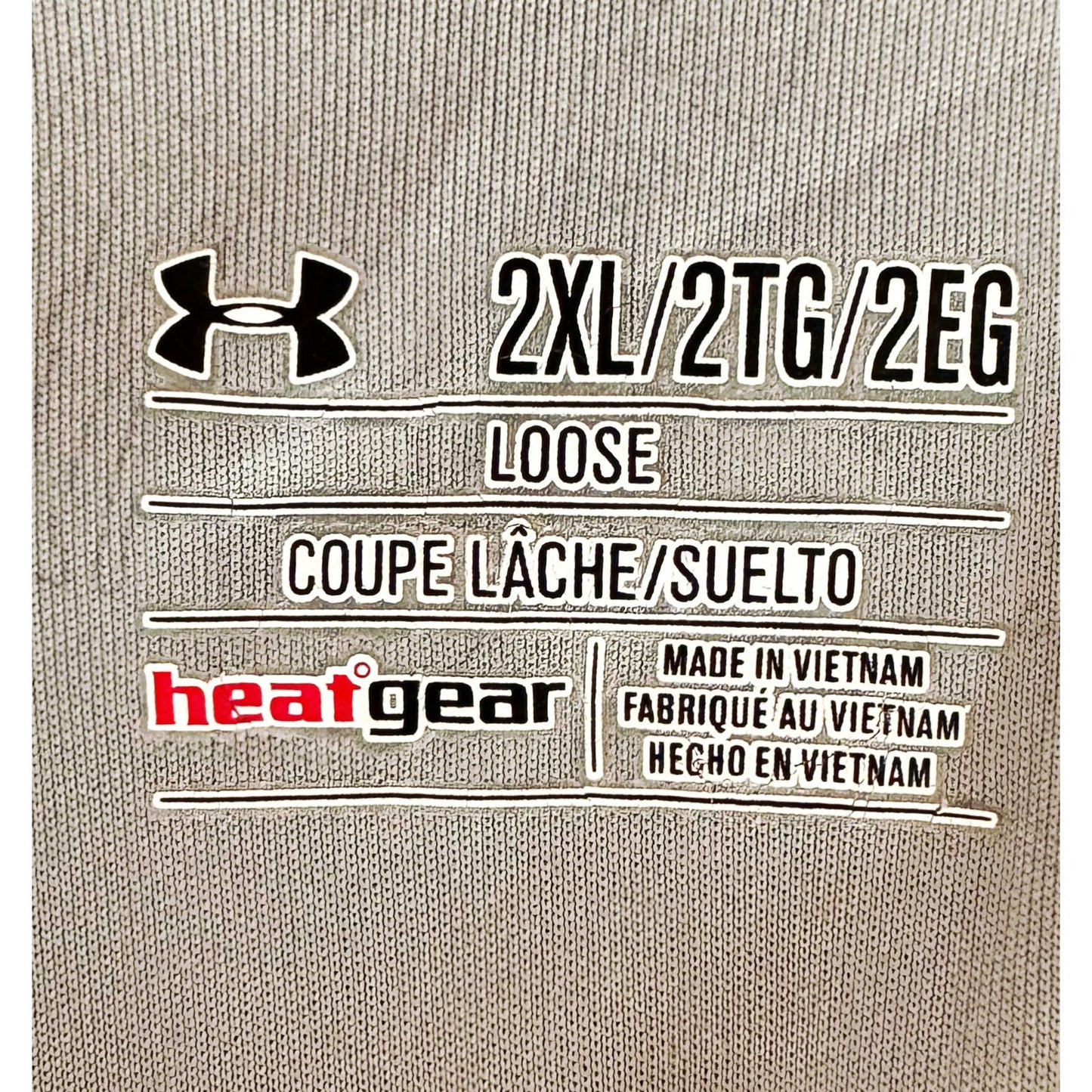 COUPE LACHE SUELTO UNDER ARMOUR SIZE-2XL Premium Polo tees