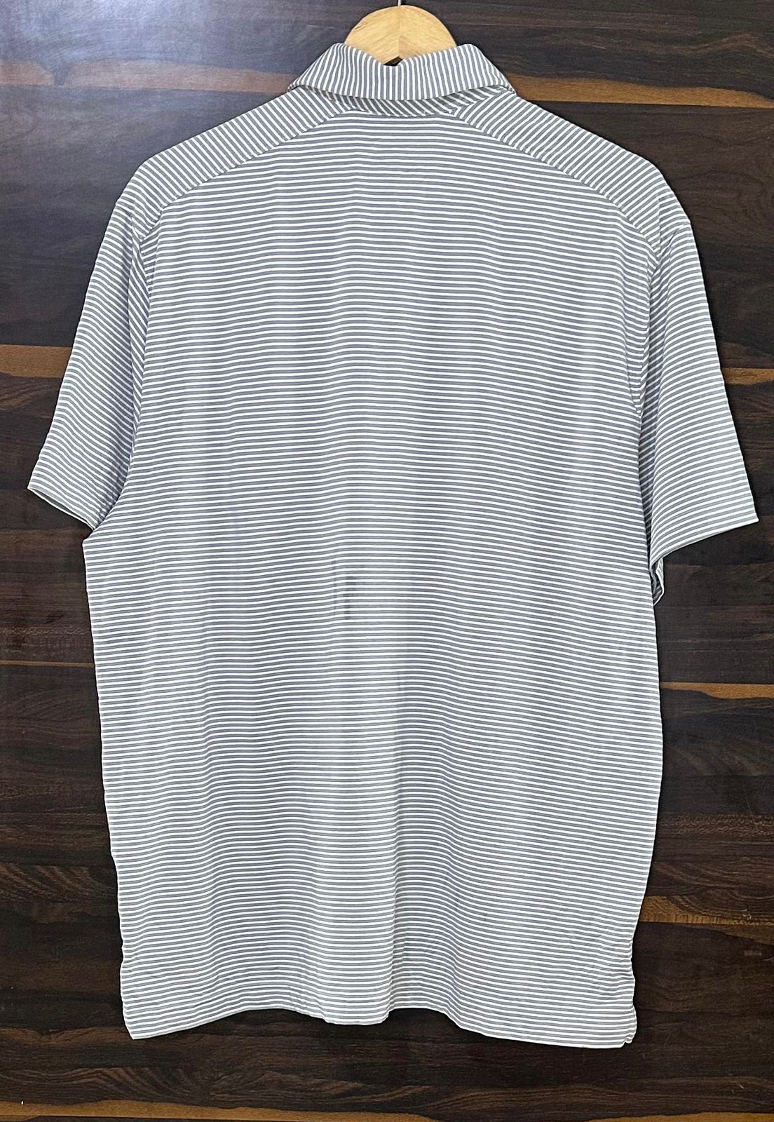 NC HEATGEAR GREY AND WHITE LINE SIZE-XL Premium Polo tees