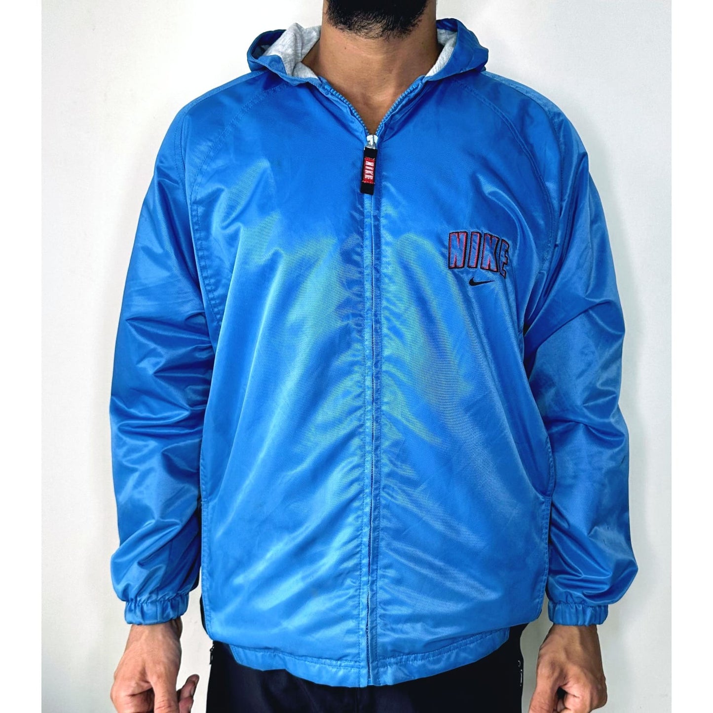 NIKE BLUE SIZE- L WINDBREAKER JACKETS