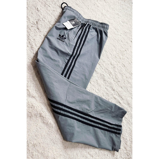 ADIDAS GREY TRACK PANTS FOR MEN – CLASSIC THREE STRIPES SPORTSWEAR TRACK
