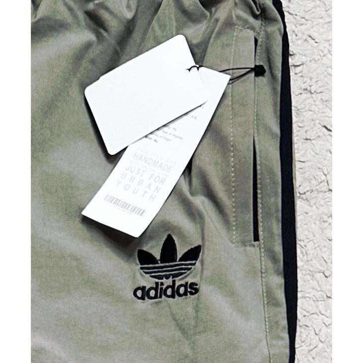 ADIDAS OLIVE GREEN TRACK PANTS FOR MEN – ICONIC THREE-STRIPE CASUAL SPORTSWEAR