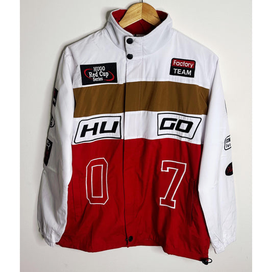 A high-impact colour-blocked jacket in a straight fit by HUGO Menswear, designed in strong cotton twill with racing-inspired badges and embroidery. Regular fit, point collar, fastening top: zip closure, pockets top: Patch pockets, inside zip pockets, ribb