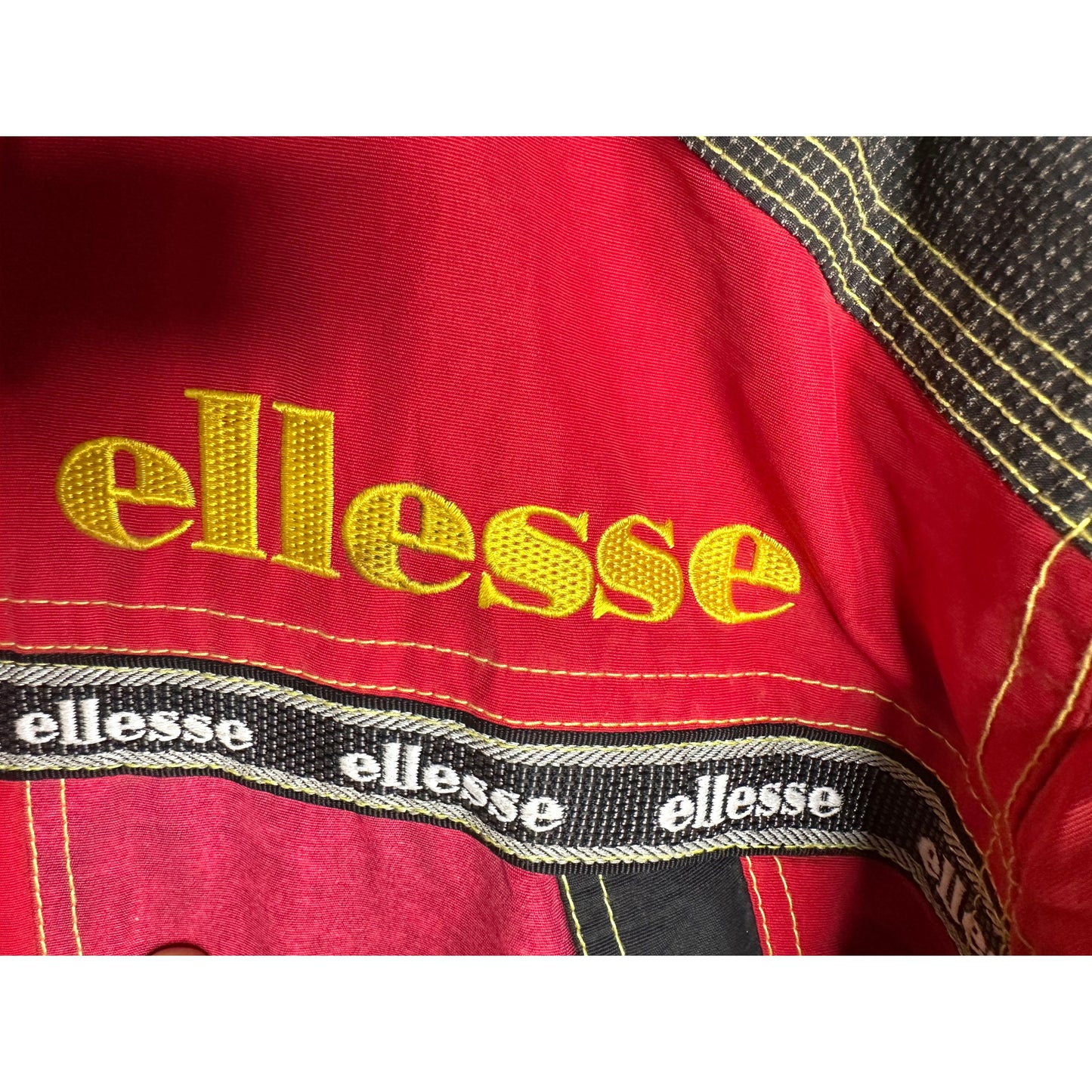 Ellesse "Excellent Equipments For Adventure Skiers" Red & Yellow Hooded Ski Jacket