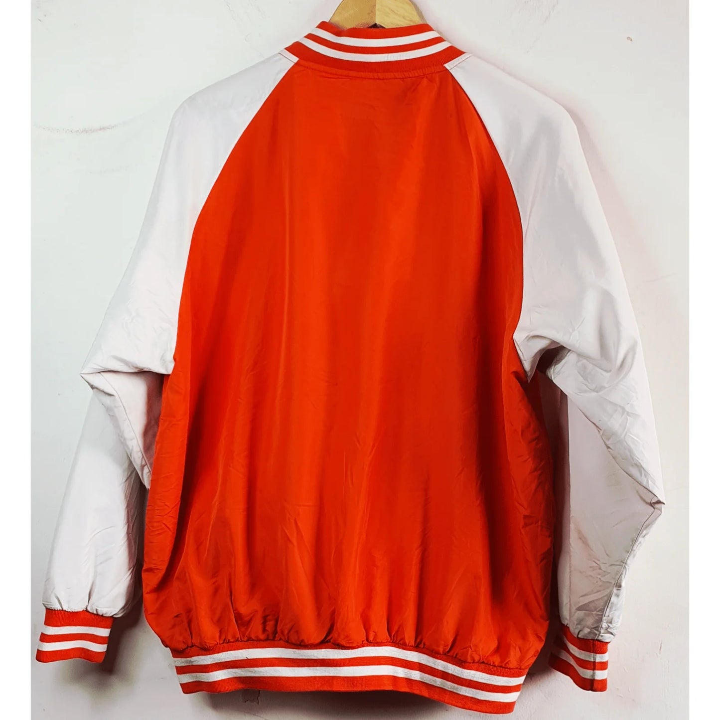 REGIA ORANGE AND WHITE VARSITY SIZE 2XL JACKET